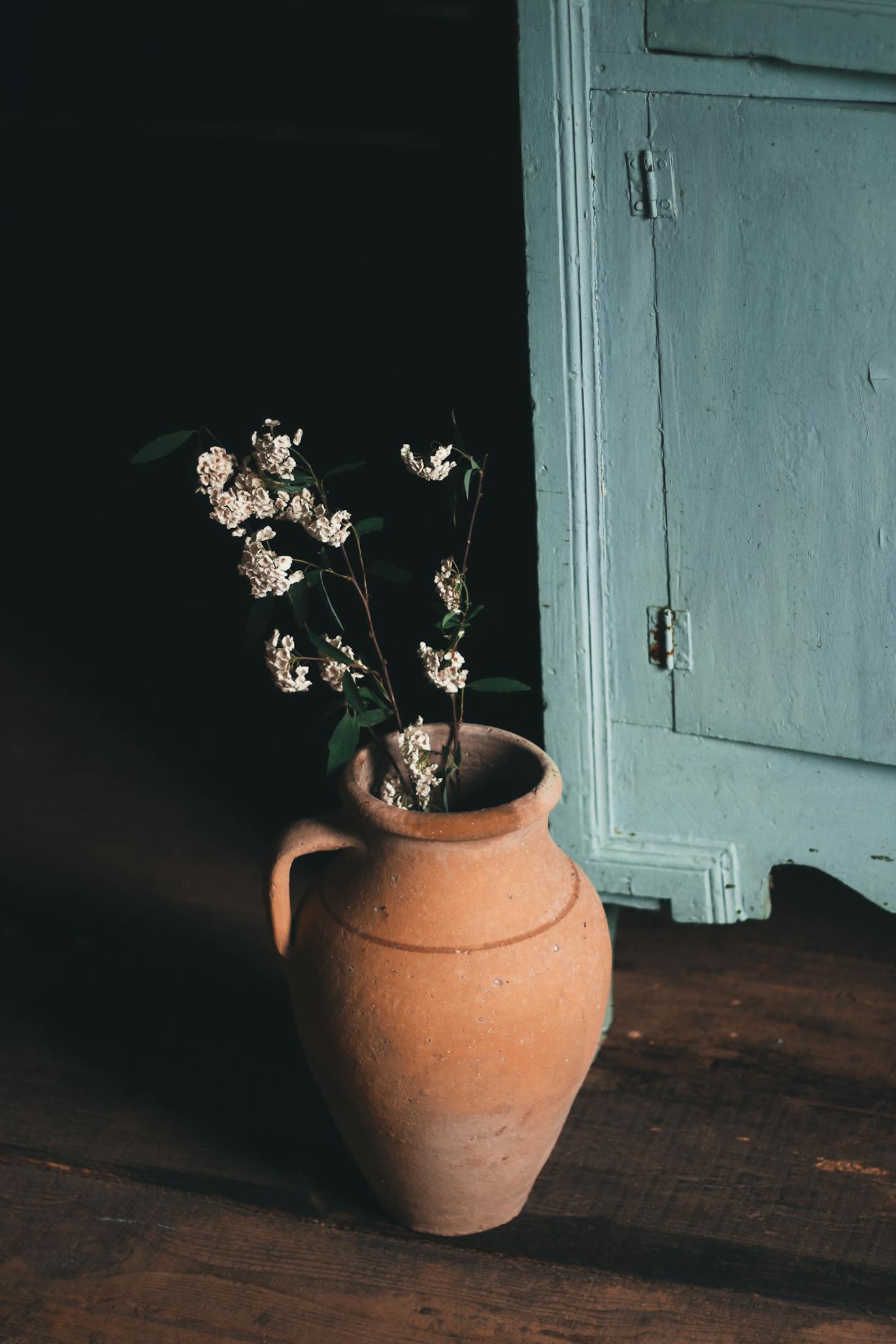 Clay vase with flower